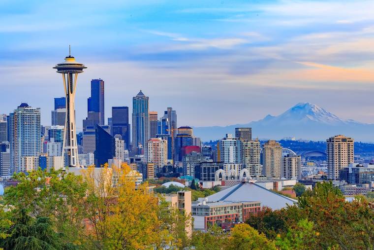 The Seattle skyline with the Space Needle and Mount Rainier beyond